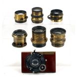 Seven Brass & Other Lenses, Two with Circular Waterhouse Stops. To include a Ensign Series VI in a