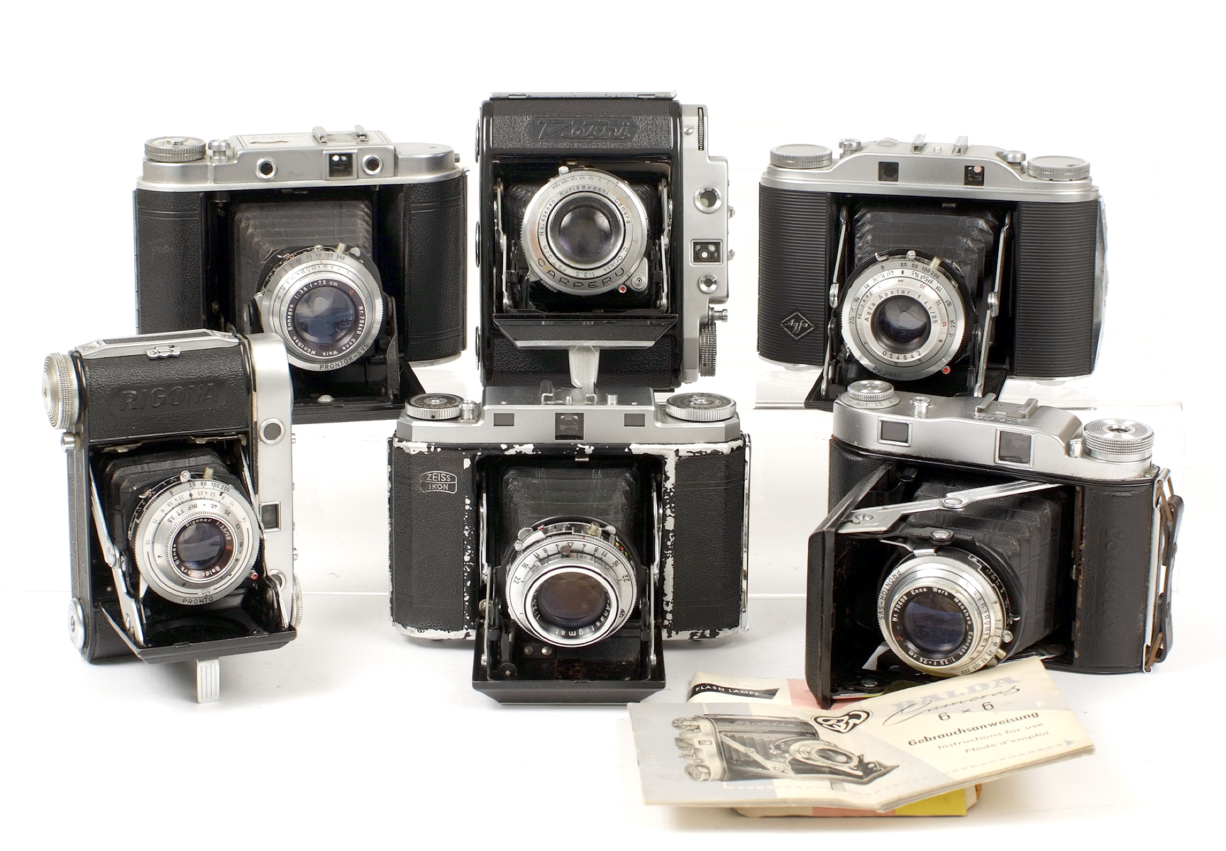 A Box of Six Various Rangefinder Cameras. Comprising Agfa Isolette III, Solida II (Made in Germany