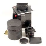 Black Leica Elmarit-M 28mm f2.8 ASPH 6-Bit Lens. #04041874. With caps, pouch, instructions etc in