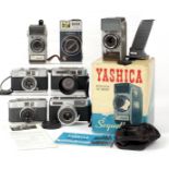 Seven Yashica Compact Film Cameras. Comprising Two Yashica Sequelle camera, one as new, boxed;