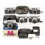 Five Minolta Half Frame Cameras. Comprising Repo, boxed with instructions, case, etc; Repo & case;