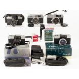 Five Half Cameras, Various Manufacturers. Comprising Olympus Pen D2, boxed with case, etc; Olympus