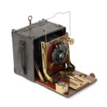 A Good Thornton Pickard Folding Ruby 1/4 Plate Wood & Brass Camera. (condition 5F).