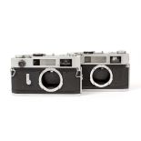 A Pair of Canon Model 7s Rangefinder Camera Bodies. #10042 with working meter, needs battery (