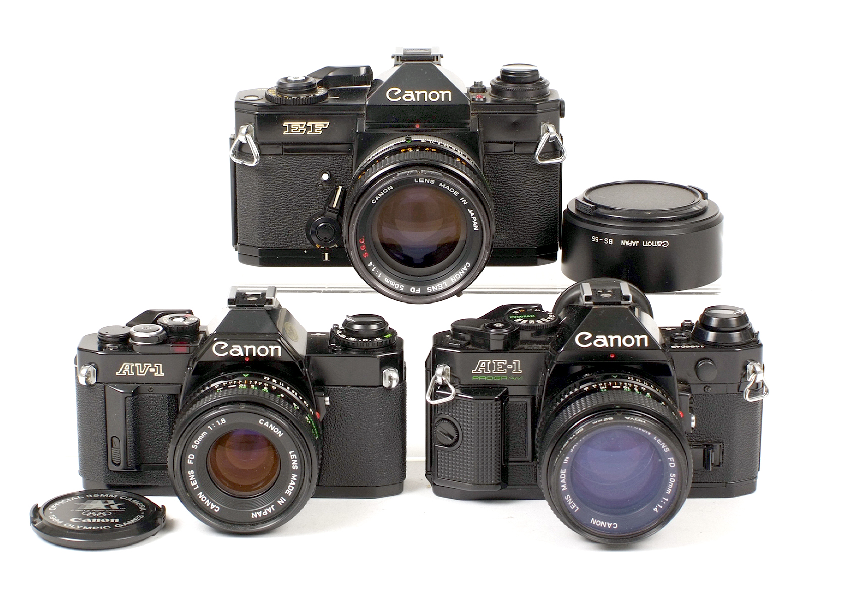 Three Canon Film Cameras, Two with 50mm f1.4 Lens. Comprising Black Canon EF #220087 with breech-