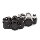Nikon FM and FE2 Camera Bodies. Comprising chrome FM body #3041797 and black FM2 body #7159486. (