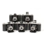 Five Ensign 12-20 Folding Roll Film Cameras. Versions I & II and with various shutter/lens
