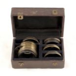 A Darlot, Paris Brass Lens Casket Set. Comprising lens with built-in rotary Waterhouse Stops (rear