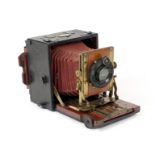 An Uncommon Gandolfi 'Universal' Quarter Plate Camera. Fitted with an Aldis-Butcher 5.5 inch f4.5