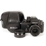 Black Nikon F2S Photomic with Nikon 50mm f2 Pre-Ai Lens. #F2 body #7157083, lens #3276233. (