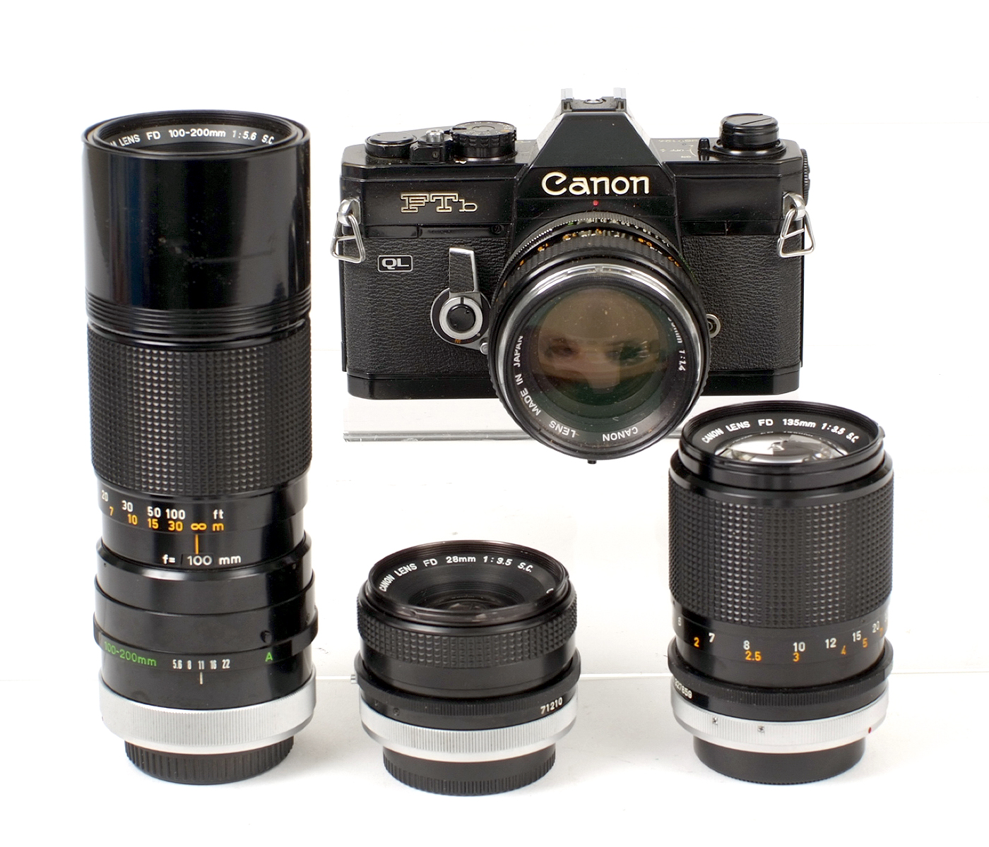 Black Canon FTb QL 4-Lens Outfit. Comprising body #369124 with FD 50mm f1.4 lens (condition 5F) &