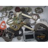 A collection of various buckles, steel buttons etc.