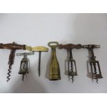 A collection of six corkscrews including Hercule