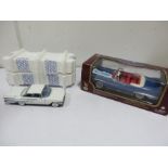 A Franklin Mint 1960 Chevrolet Impala and a Road Legends 1958 Cadillac Eldorado Biarritz