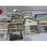 A collection of various vintage postcards