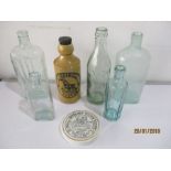 A small collection of bottles, Ginger beer bottle ( Exeter) and a Bell's Betelnut Toothpaste, Ferris