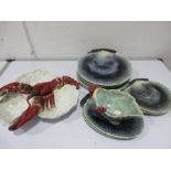 A lobster dish along with eight plates in the form of shells and a gravy boat A/F