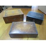 Two jewellery boxes along with a cigarette box