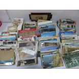 A collection of various vintage postcards etc