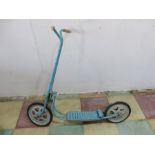 A vintage child's Mobo scooter