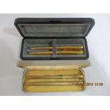 A cased Yard O Led pen and pencil set along with a Parker pen and pencil in case