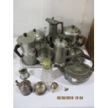 A collection of pewter and silver plated items