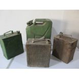 A Jerry can along with three petrol cans