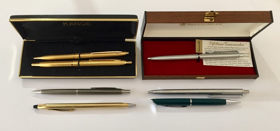 A collection of various pens and propelling pencils.