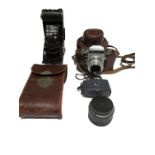 A vintage Voigtlander camera along with a Thagee Exa camera etc.