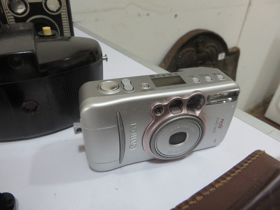 A collection of various cameras including Kodak, Canon, Brownie, Praktica, Pentax etc - Image 8 of 20