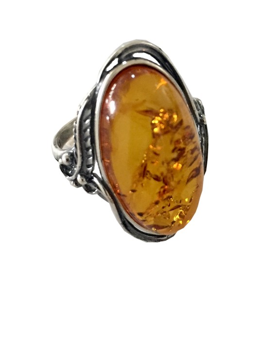 Silver ring with a large amber stone