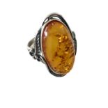 Silver ring with a large amber stone