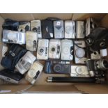 A collection of various cameras including Canon, Olympus, Pentax etc