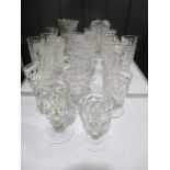 A collection of early 20th century moulded glasses including rummers