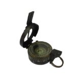 A WW2 Military Mark III compass by TG Co LTD, London, with broad arrow stamp, dated 1944, serial no.