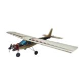 A large Robbe Cesna remote control model aeroplane, in need of attention along with a Techniplus