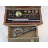 A cased Sykes hydrometer (some weights missing) along with a Brown & Sharpe micrometer in original