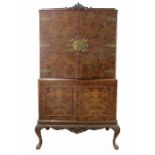 A walnut veneered cocktail cabinet with cupboard under with chinoiserie detailing - keys in office