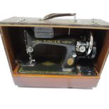 A Singer sewing machine in carry case