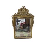 A large ornate gilt mirror - 160cm overall height