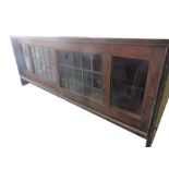 A low display cabinet with sliding doors