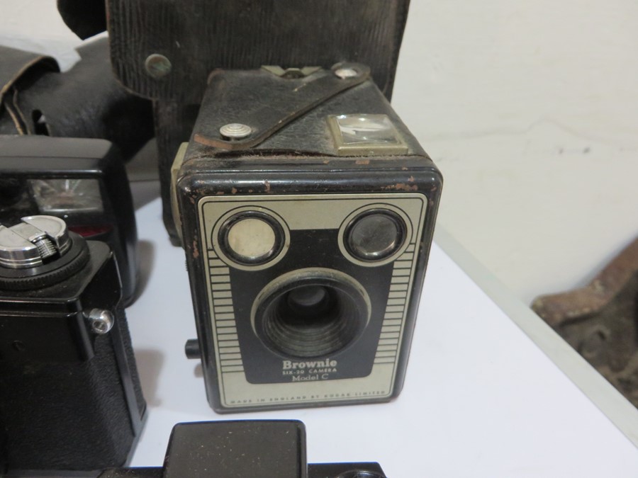 A collection of various cameras including Kodak, Canon, Brownie, Praktica, Pentax etc - Image 16 of 20