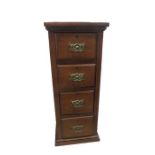 A narrow chest of four drawers