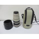 A Canon EF 100-400mm 1:4.5-5.6 ultrasonic zoom lens in soft carry case