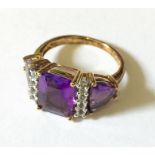 A 9ct gold amethyst and diamond dress ring.