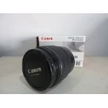 A boxed Canon EFS 15-85mm 3.5-5.6 Image Stabilizer Ultrasonic lens