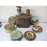 A collection of various vintage tins