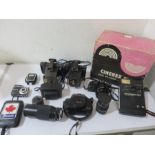 A collection of various cameras and lenses including polaroid cameras, kodak etc and a Cinerex 818