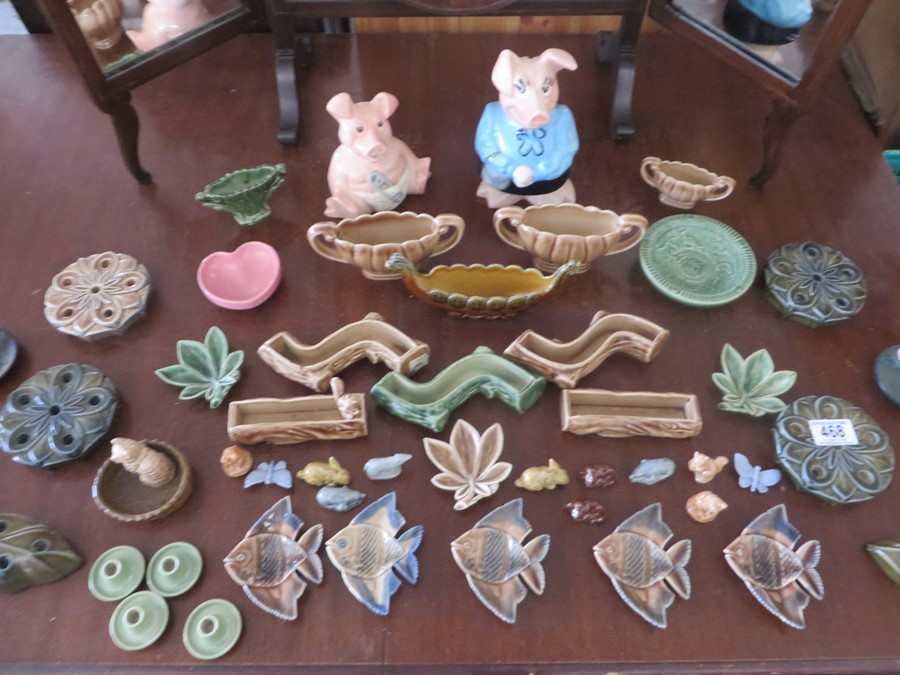 A collection of Wade including two Nat West pigs, candle holders, whimsies etc.