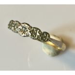 A diamond 5 stone ring in 18ct gold and platinum